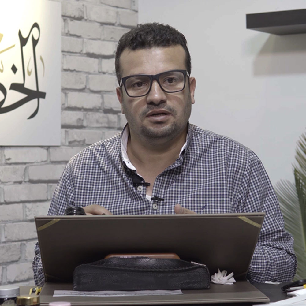 Calligrapher Abdo Al-Gamal